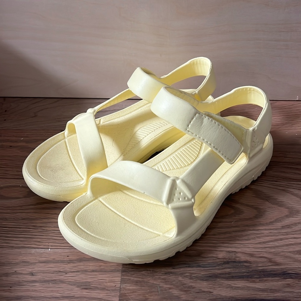 Teva Yellow water sandals.